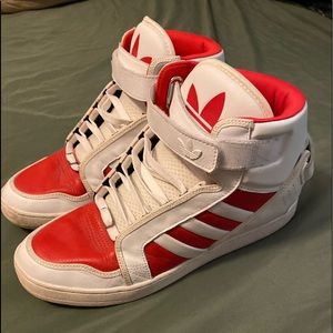 white and red adidas sneakers